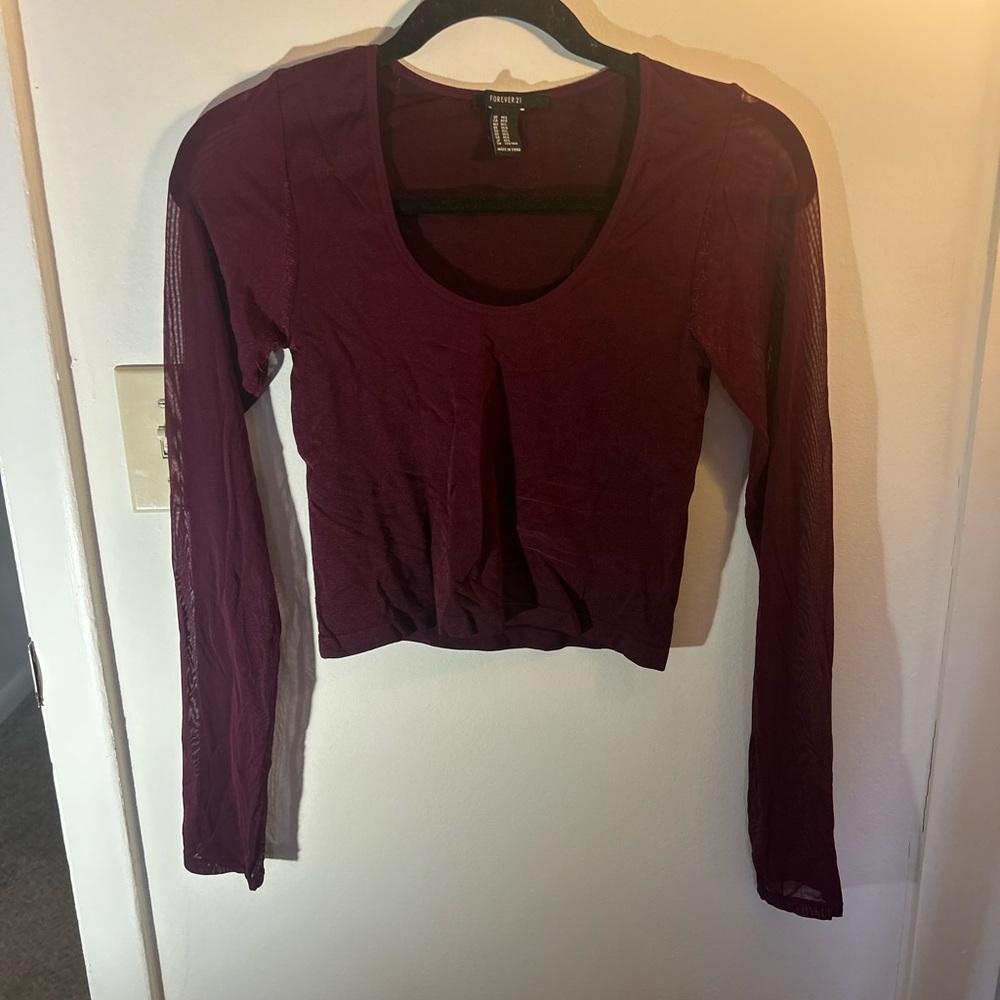 Crop top with mesh sleeves